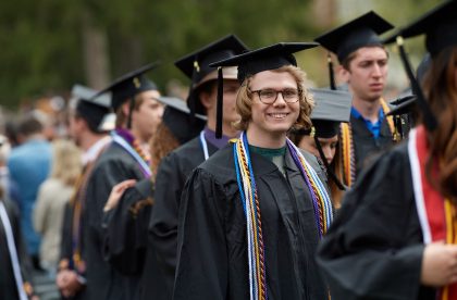 Group of students outside on graduation day.