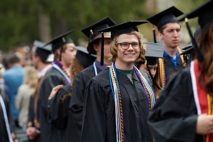 Group of students outside on graduation day.