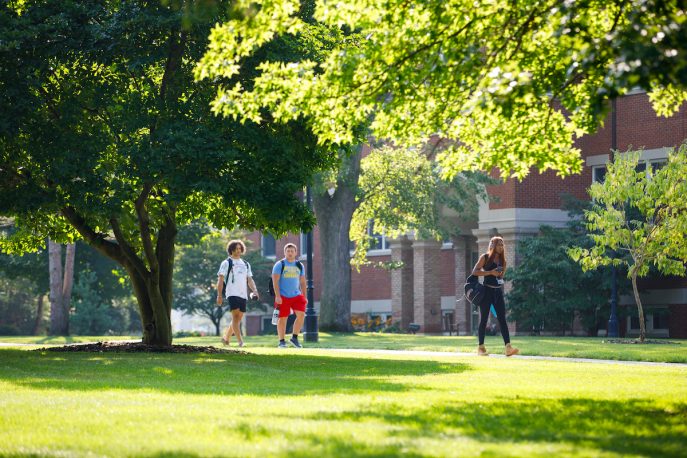 Students walking across Albion College campus