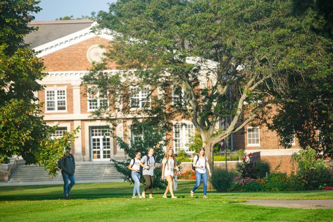 Albion College students walking across campus.