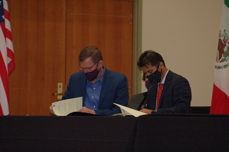 Dr. Mathew Johnson (left), president of Albion College, and Fernando González Saiffe, consul general, Consulate of Mexico in Detroit.
