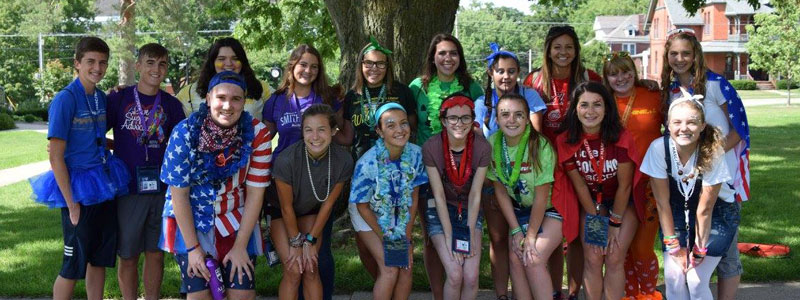 Group of students posing for the camera outside