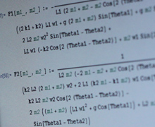 Close-up image of math equations on paper.