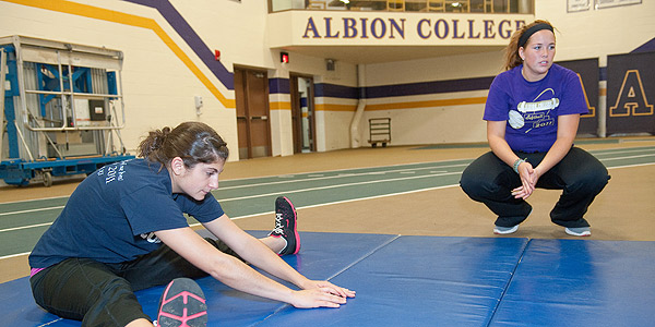 Students stretching in the dow filedhouse