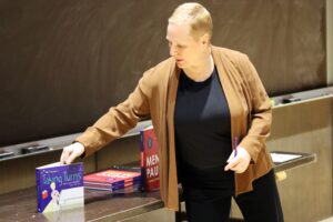 MK Czerwiec with her book.